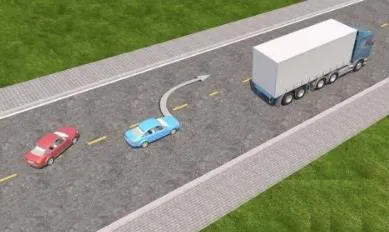 Câu 598: Trong tình huống dưới đây, xe con màu đỏ có được phép vượt khi xe con màu xanh đang vượt xe tải hay không?